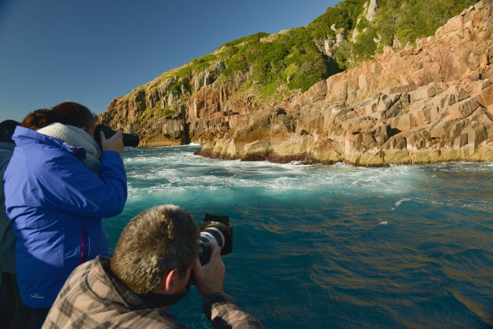 a man standing on top of a mountain