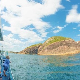 a group of people in blue water