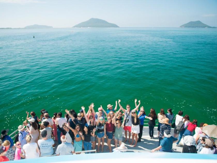 a group of people in a large body of water
