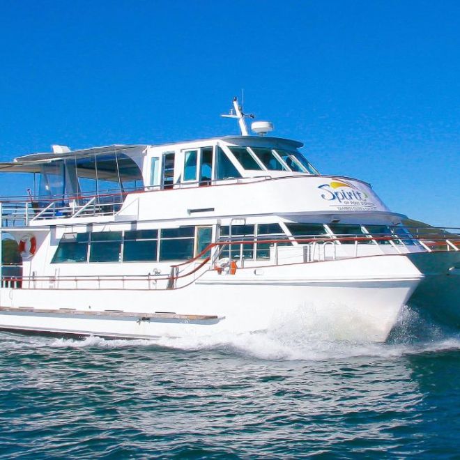 a small boat in a large body of water