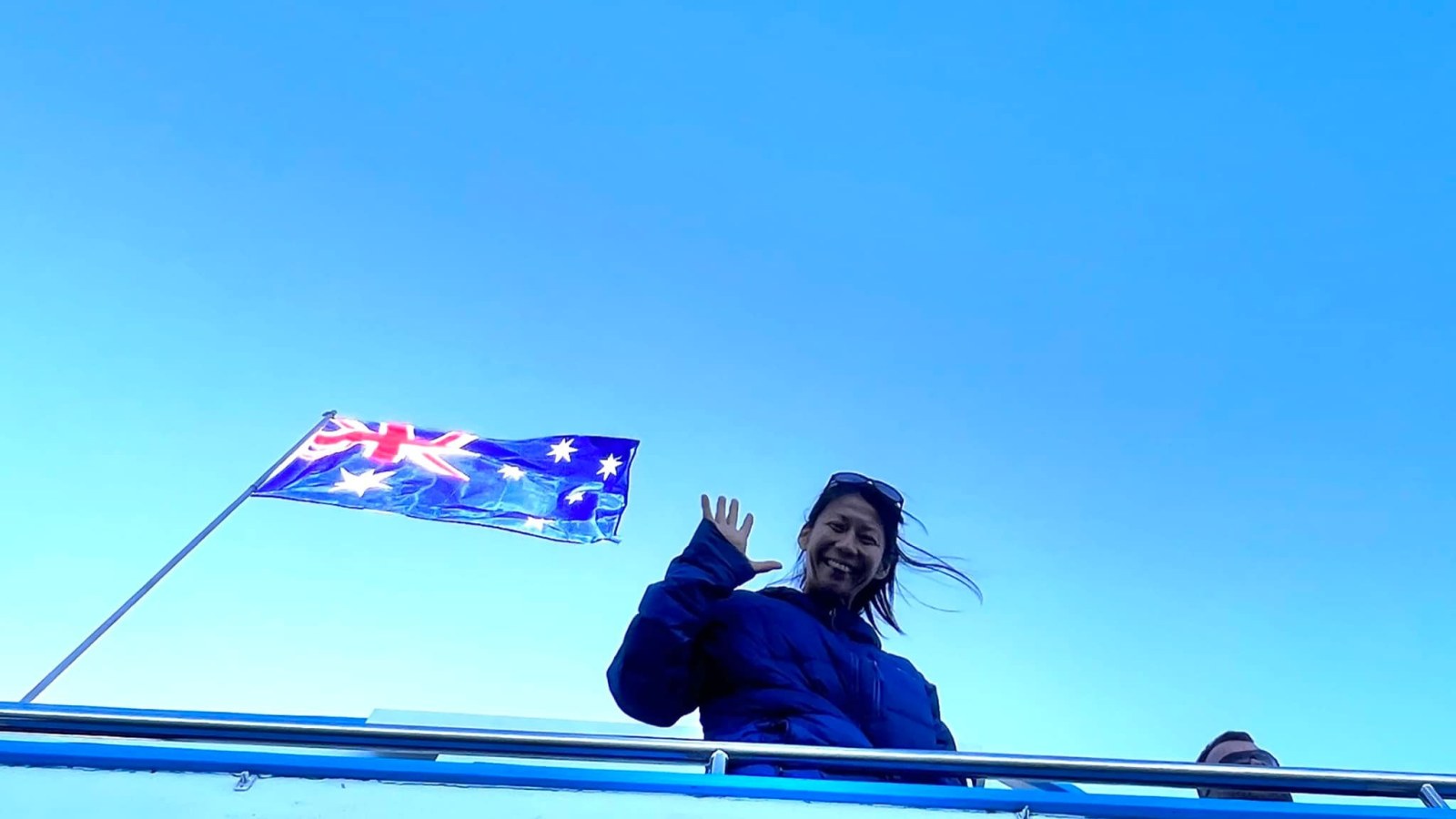 a person standing in front of a laptop