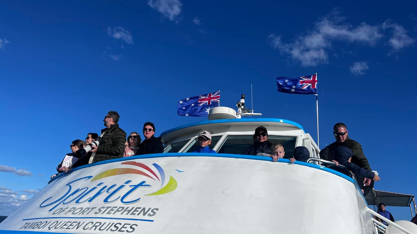 a man jumping in the air doing a trick on a skateboard